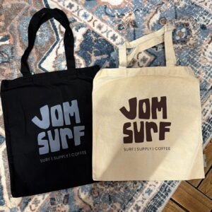 Black & Beige Jomsurf canvas tote bags with surf-inspired logo design